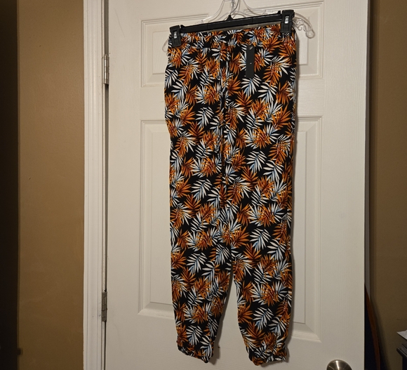 Stylish Black and Orange Leaf Print Pants - Picture 1 of 4